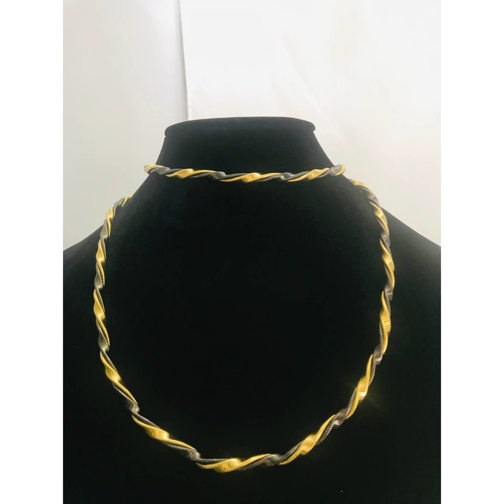 gold-tone & black twisted long stamped / signed Mo